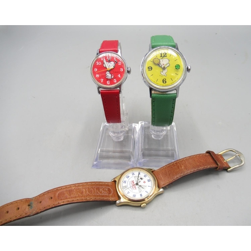 239 - Timex, Great Britain - 'Snoopy playing tennis' chrome wristwatch, yellow dial with Arabic and baton ... 