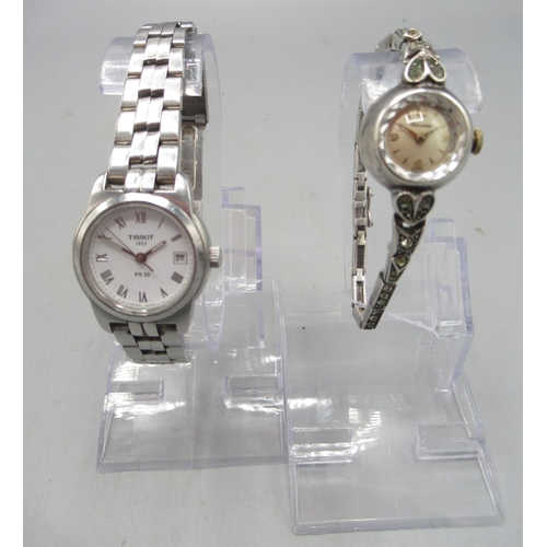 240 - Tissot PR 50 lady's stainless steel quartz wristwatch with date on original bracelet, signed white R... 