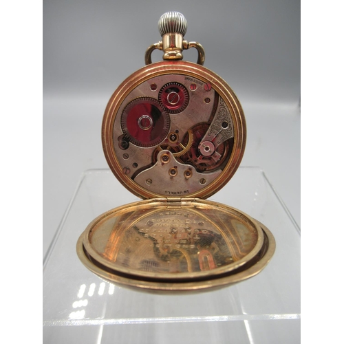 243 - Swiss rolled gold keyless pocket watch, white enamel Roman dial with subsidiary seconds, Dennison Wa... 