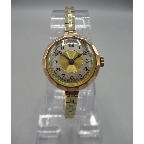 244 - Swiss lady's 9ct gold wristwatch on box link bracelet stamped .375, gold coloured dial with silvered... 