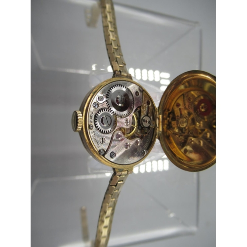 244 - Swiss lady's 9ct gold wristwatch on box link bracelet stamped .375, gold coloured dial with silvered... 