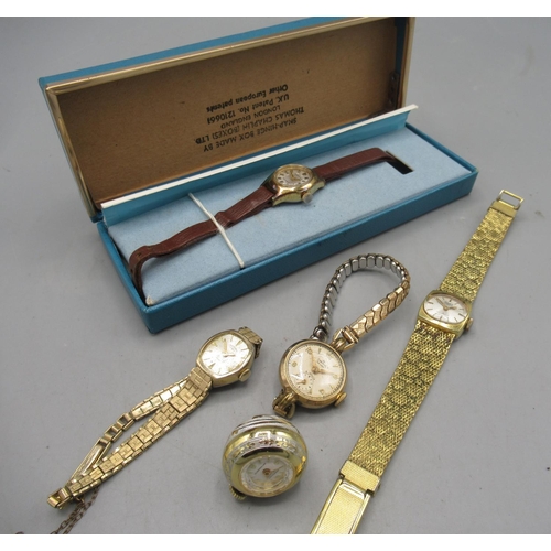 247 - Smiths De Luxe lady's gold plated wristwatch on gold plated expanding bracelet, signed silvered dial... 