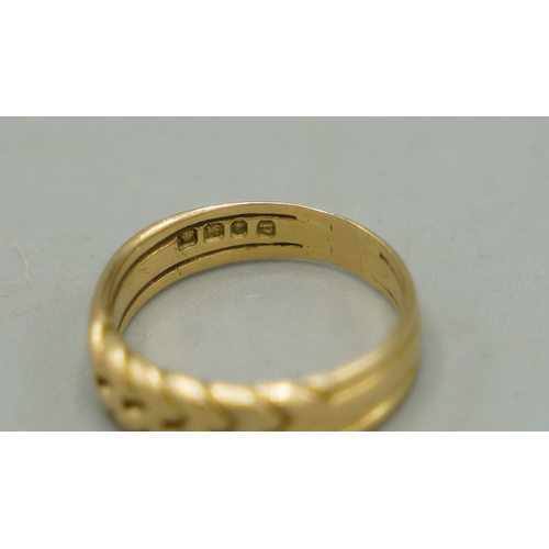 137 - 18ct yellow gold keepers ring, stamped 18, size M1/2, 4.51g

Shipping £20.00 plus vat (UK Only)