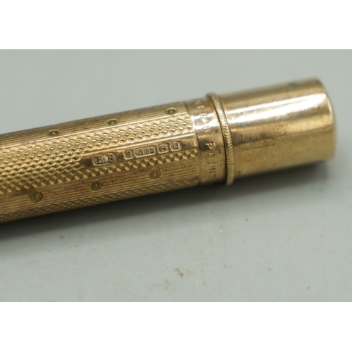 142 - 9ct yellow gold Baker's Pointer pen, stamped 375, 34.44g

Shipping £28.00 plus vat (UK Only)