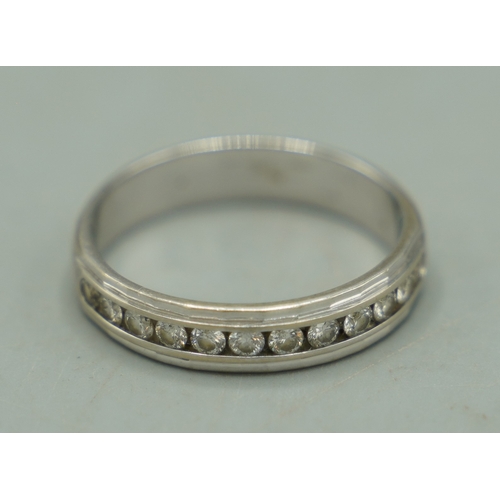 164 - 18ct white gold half eternity ring set with brilliant cut diamonds, stamped 750, size S1/2, 4.60g

S... 