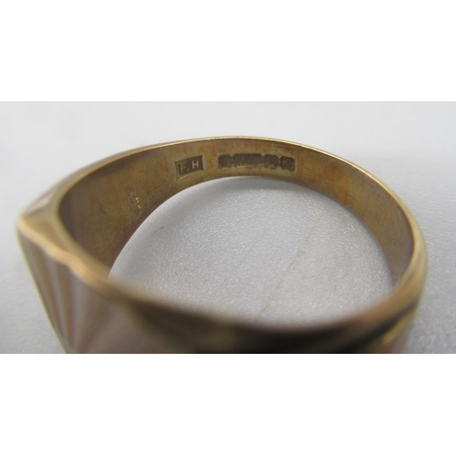 45 - 9ct yellow gold signet ring with sunburst design to face, stamped 375, size R, 6.56g

Shipping £20.0... 