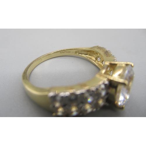 46 - 14ct yellow gold ring set with central large clear stone on clear clear stone set shoulders, stamped... 