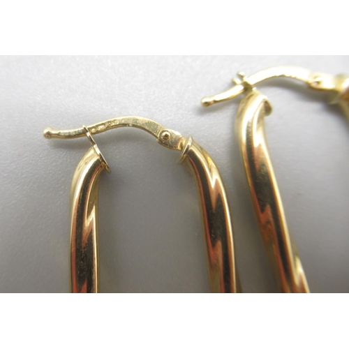 49 - 9ct yellow gold rectangular twist earrings, and a pair of 9ct gold hoop earrings with engraved patte... 