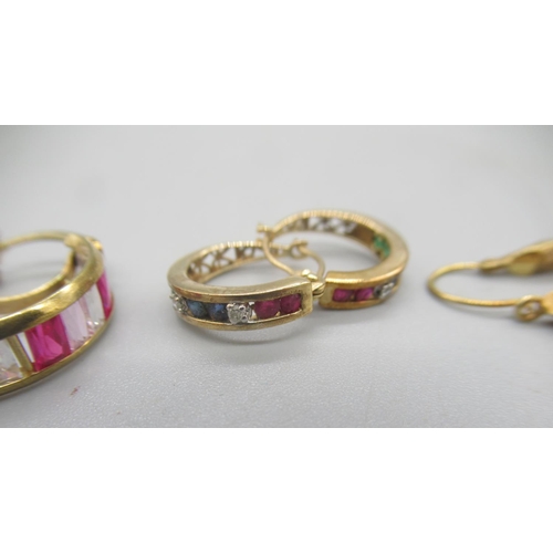 51 - 9ct yellow gold earrings set with coloured pink stones, a smaller pair of 9ct gold earrings set with... 