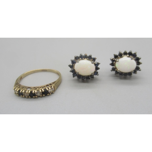 166 - 9ct yellow gold ring set with blue and white stones, stamped 375, size M, 1.33g, and a pair of silve... 