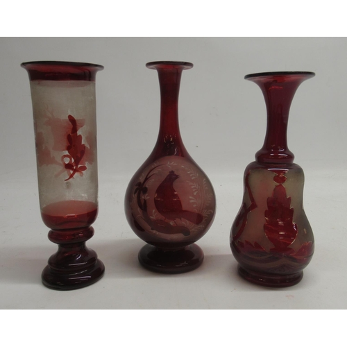 188 - Two 19th Century ruby tinted liqueur glasses, wheel cut decoration, H10cm and other later ruby tinte... 