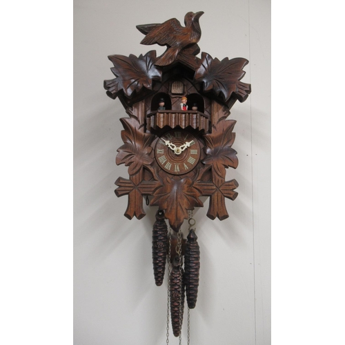 190 - 20th Century stained beech Black Forest musical wall clock, the case with carved decoration with bir... 