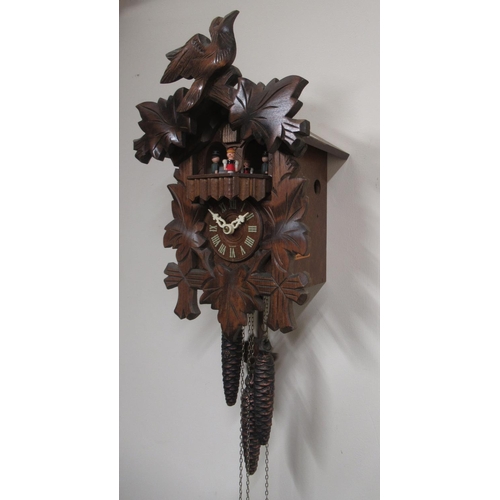 190 - 20th Century stained beech Black Forest musical wall clock, the case with carved decoration with bir... 