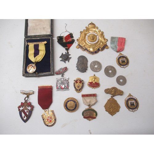 172 - Yellow metal and enamel Cecil Lodge Masonic badge, a boxed Treasurer Masonic medal, and a collection... 