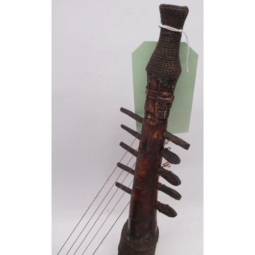 130 - 20th century Congolese tribal anthropomorphic harp/Kundi, figural neck with four strings, gourd shap... 