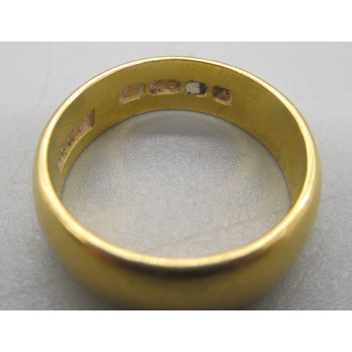 36 - 22ct yellow gold wedding band stamped 22, size M, 6.94g