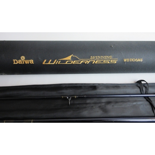 606 - Daiwa 'Wilderness' six section spinning rod, complete with original sleeve and carrying tube with mi... 