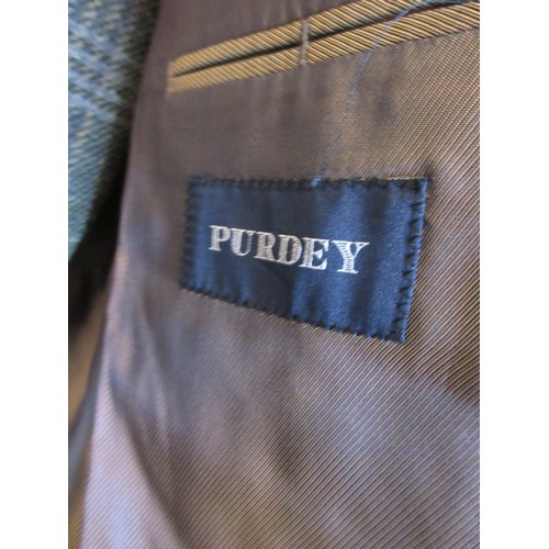 643 - Purdey green tweed shooting suit jacket (size 42) and matching trousers (waist 32'')

SHIPPING £38.0... 