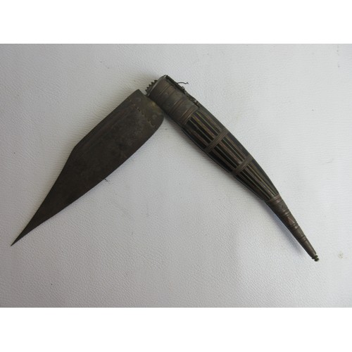 Large Navaja-style fighting knife with ornate metalwork to handle and ...