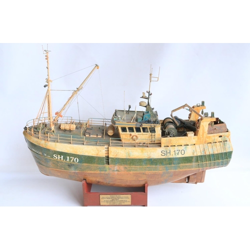 Large well detailed kit built remote control 1/32 scale twin rig trawler model, fibre glass hull SH.170 'Maggie M' based on the 1990 built vessel from Scottish Campbeltown Shipbuilders and operated out of Scarborough, weathered finish with 50mm single screw propeller and wood display stand, overall length approx 85cm, beam 25.5cm, model dusty and would benefit from cleaning