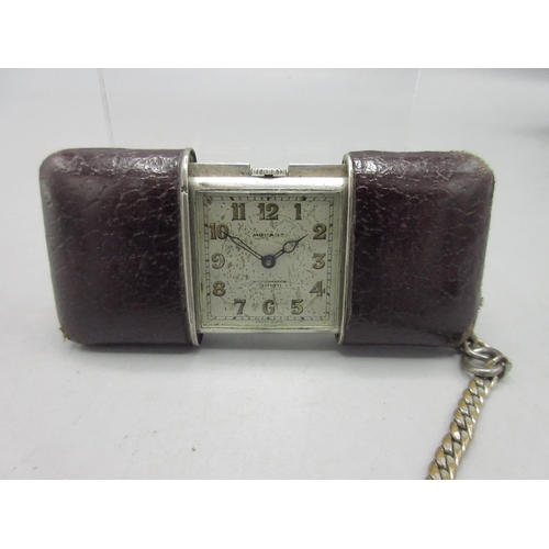 Movado Ermeto ladies silver purse watch on plated chain, leather trimmed sliding outer case, signed silvered Arabic dial, case back no. 1195829, London Import Mark 1928, gross weight 2.5ozt, W47.4mm (open W72.6mm)