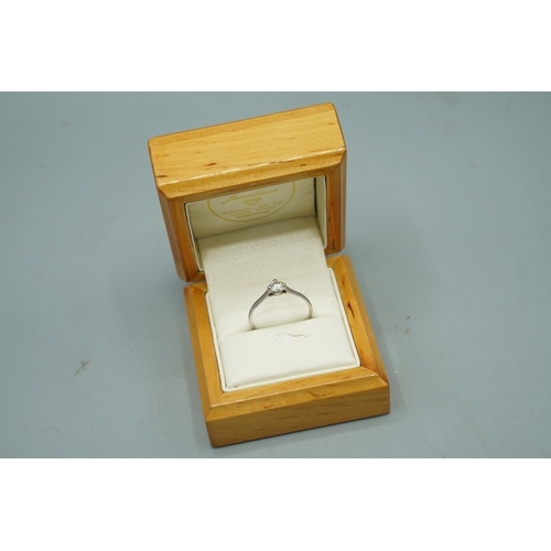 White metal solitaire ring set with single round cut diamond in claw setting, no visible hallmarks, size Q1/2, 1.92g, boxed

Shipping £23.00 plus vat (UK Only)