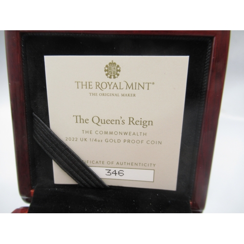 34 - The Royal Mint - The Queens Reign The Commonwealth 2022 UK 1/4oz Gold Proof Coin encapsulated in cas... 