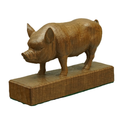 Stan Woodpeckerman Dodds - carved oak model  of a standing pig, on rectangular plinth, carved with signature woodpecker and dated 2002, W17cm D5cm H10cm

Shipping £38.00 plus vat (UK Only)