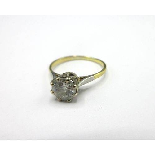 1112 - Yellow metal diamond solitaire ring, the brilliant cut diamond in white metal claw mount, on plain y... 