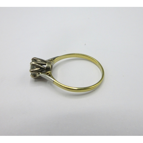 1112 - Yellow metal diamond solitaire ring, the brilliant cut diamond in white metal claw mount, on plain y... 