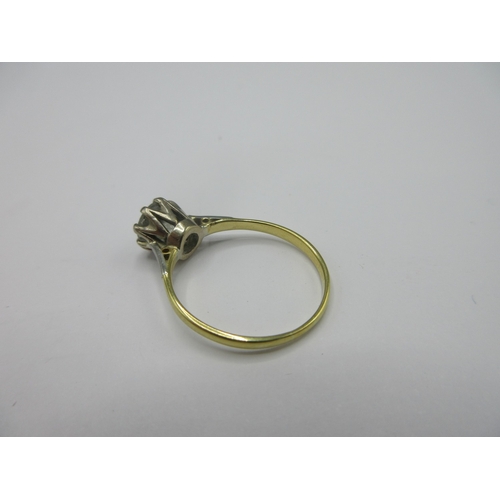 1112 - Yellow metal diamond solitaire ring, the brilliant cut diamond in white metal claw mount, on plain y... 