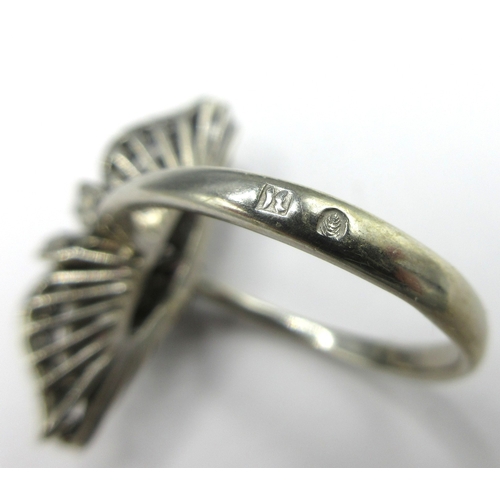 1110 - C1970s white metal three stone cluster ring set with three rubies surrounded by a shaped border set ... 