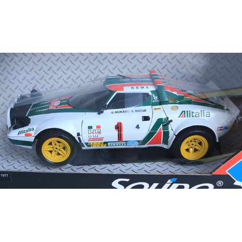 329 - Four 1/18 scale diecast rally car models, all with condition issues to include a limited edition Sun... 