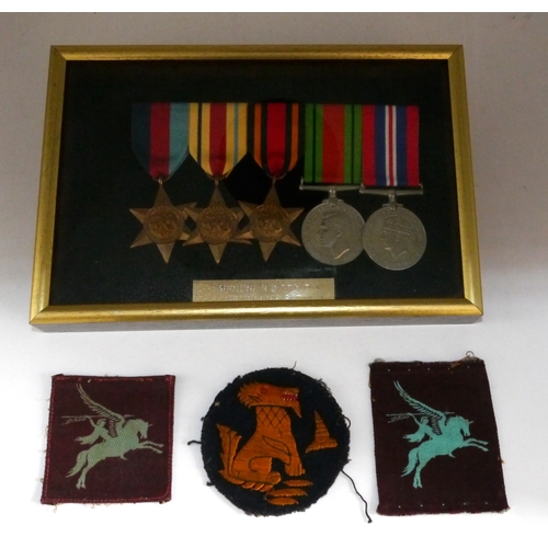 Collection of Medals and military papers to 3601196 R.D. Stout Border Regiment. 1939-45 Star, The Africa Star, The Burma Star, Defence Medal, 1939-45 War Medal. 1939-45 Defence Medal to Mr John Stout, in original post box and certificate. Chindits 3rd Indian Division Formation Badge, which depicts the mythical Burmese Chinthe. Two 1st Airborne Patches. Dog Tags, Letter home to say that Raymond was missing 1940, homemade post card posted in France to Mother, Soldiers Release Book, Record of Service, The Story of the Border Regiment Book, Framed certificate to Raymond from the people of Norway for the liberation 8th May 1945. Raymond's Australian Slouch Hat with Borders Regimental Badge.

Shipping £38.00 plus vat (UK Only)