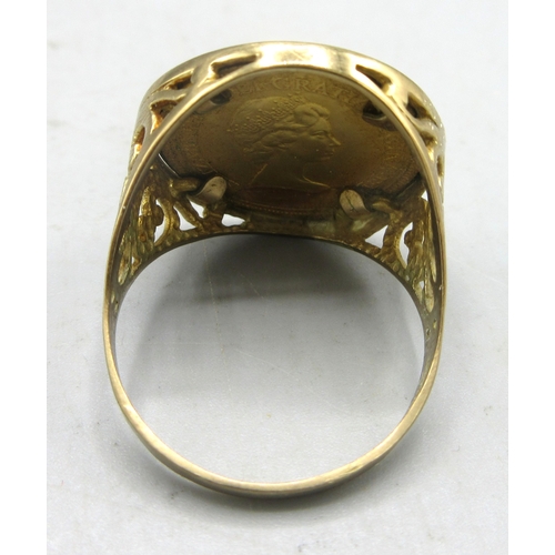 23 - ER.II 1982 half sovereign, in ring mount, stamped 375, size X, 7.70g

Shipping £20.00 plus vat (UK O... 