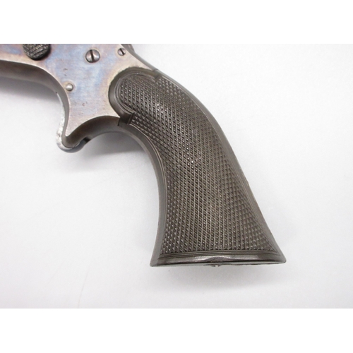 20 - Sharps & Hankins .32 rimfire four shot Derringer pistol, 3.5