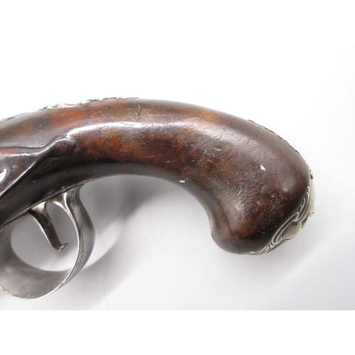 36 - A fine Queen Anne silver mounted half stocked flintlock 20 bore pistol by `T. Davis London' 5.5