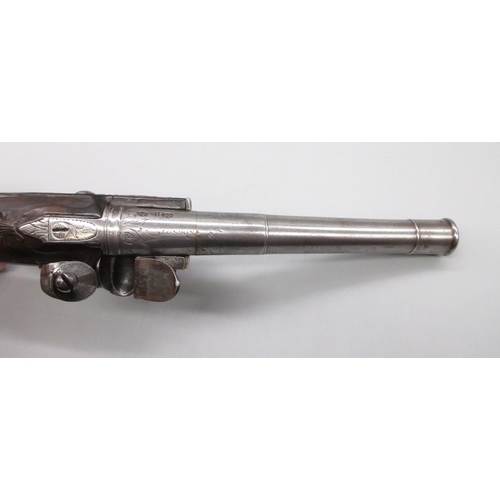 36 - A fine Queen Anne silver mounted half stocked flintlock 20 bore pistol by `T. Davis London' 5.5