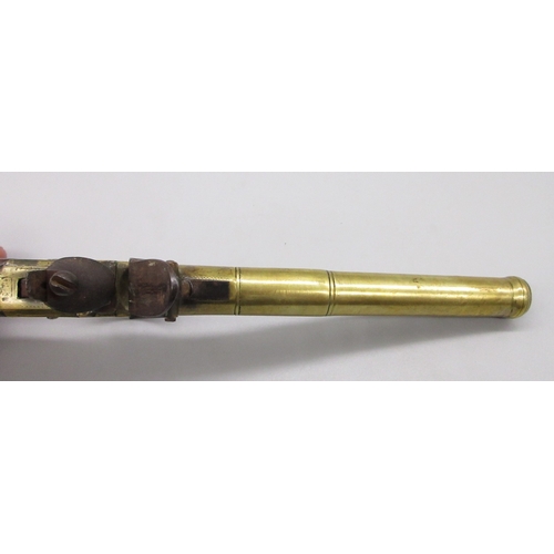 39 - 24 bore brass flintlock silver mounted cannon barrel  pistol by `Hadley London' 5.5
