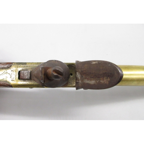 39 - 24 bore brass flintlock silver mounted cannon barrel  pistol by `Hadley London' 5.5