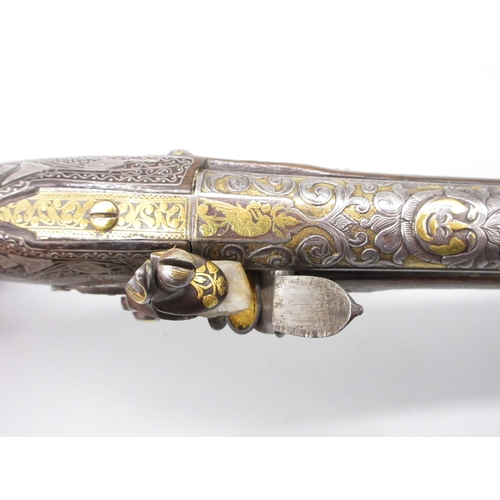 50 - Extremely ornate white and yellow metal early 19th Century Turkish 22 bore flintlock holster pistol,... 
