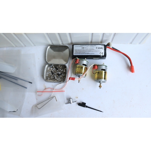 33 - Three large scale radio controlled models to include two helicopters, a Copter X450 in metal flight ... 