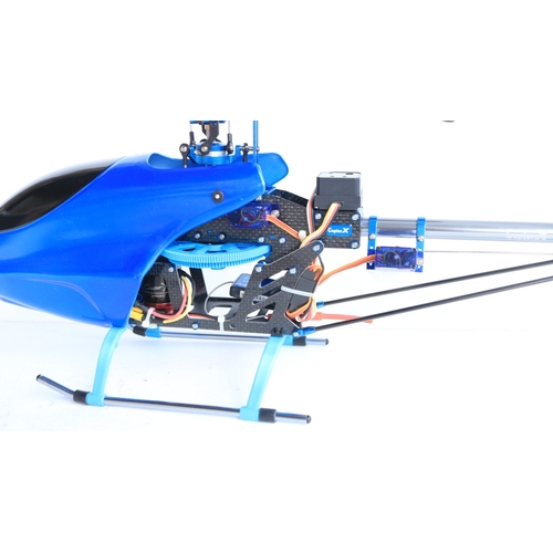 33 - Three large scale radio controlled models to include two helicopters, a Copter X450 in metal flight ... 