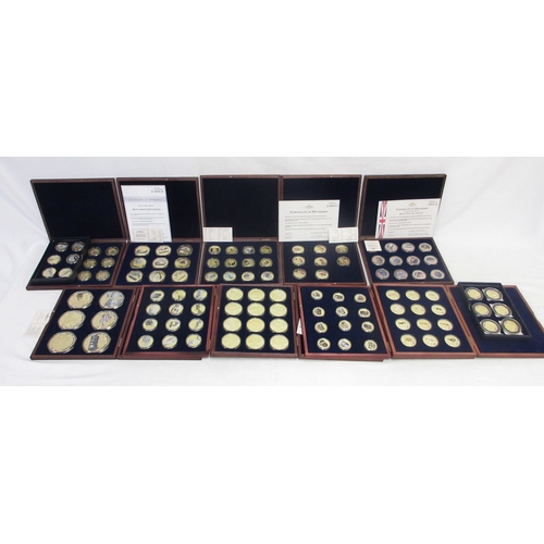 Large collection of commemorative plated coins in sets (partially ...
