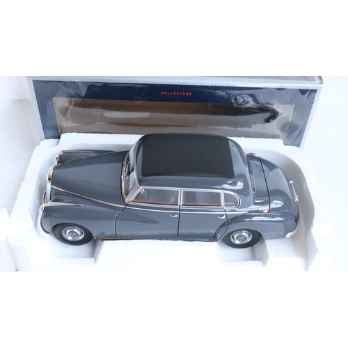 50 - Four diecast 1/18 scale vintage themed car models to include a Sun Star Jaguar XK140 Drophead Coupe,... 