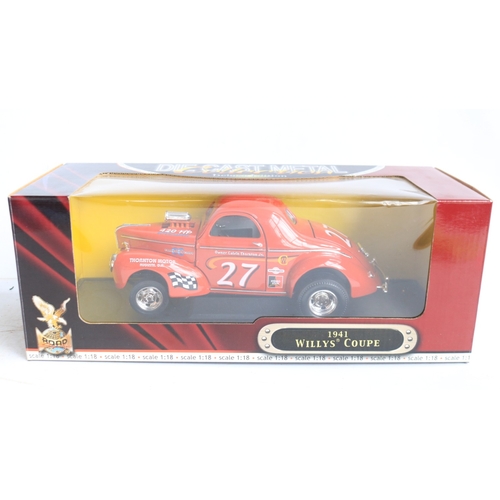 50 - Four diecast 1/18 scale vintage themed car models to include a Sun Star Jaguar XK140 Drophead Coupe,... 
