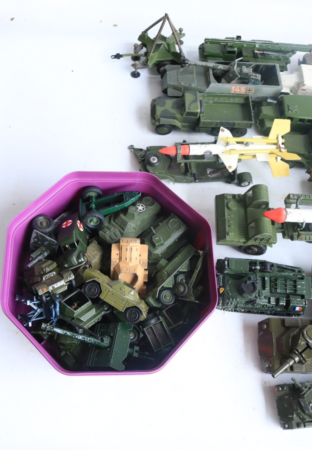 Extensive collection of unboxed mostly diecast model military vehicles ...