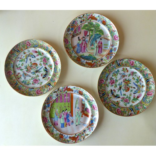 688 - Four Canton Famille rose plates, two with central court scenes, two with botanical patterns, D25cm a... 