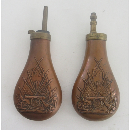 Pair of powder flasks, made in Italy, with military embossing of rifles ...