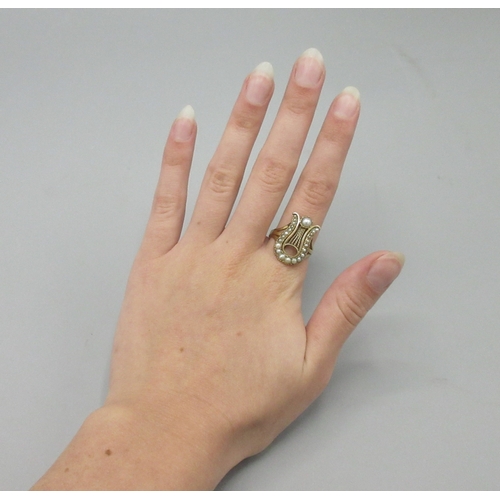 1036 - 18ct yellow gold Georgian mourning style ring set with pearl, stamped 18, size R, 3.5g

Bradleys shi... 